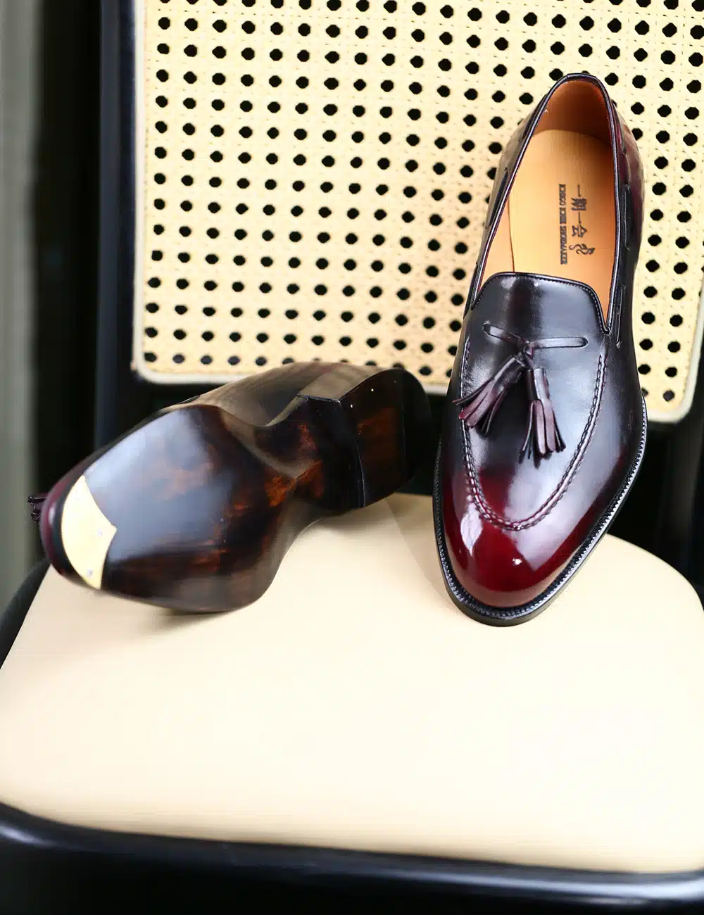Reverse burgundy tassel loafer